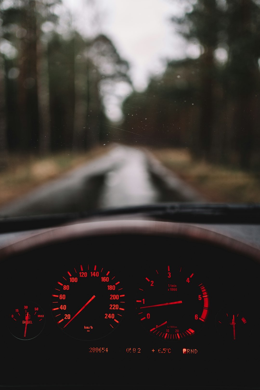 Home a-car-dashboard-with-a-red-light-j6-3nmyvhy4